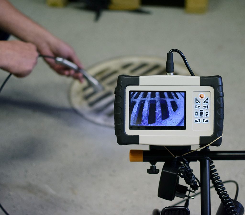 Camera inspection technology reaches into sewer to find the source of a break.